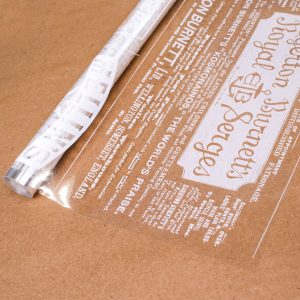 Пленка с рисунком "Газета" белая 70 см * 200гр
